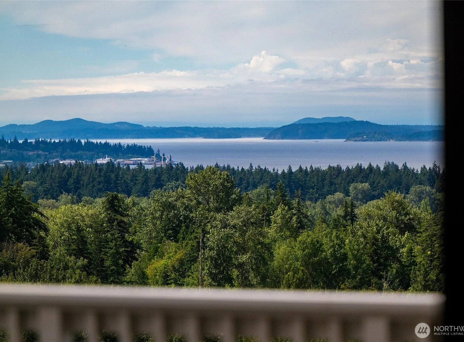 Panoramic view of Bellingham Bay and the San Juan Islands from the home's covered deck.